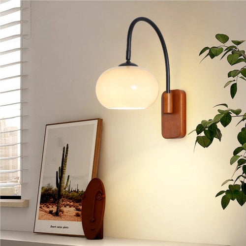 LumiGlide – Rotating Bauhaus Glass Wall Lamp