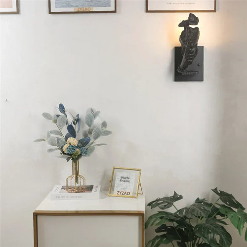 GoldenGaze - Modern Art Deco Wall Lamp with Golden Face Design