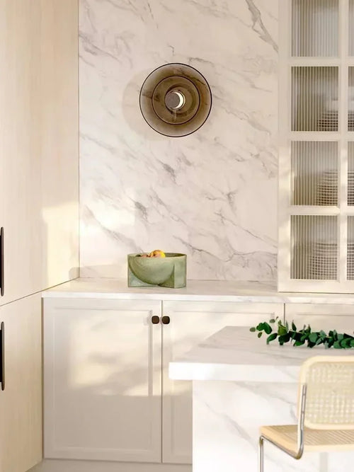 LumiDisc – Amber Glass Wall Lamp for a Warm Ambiance
